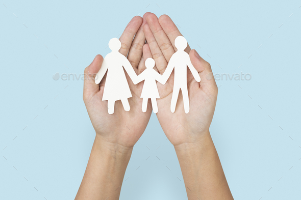 Happy family paper hand craft charity symbol - Stock Photo - Images
