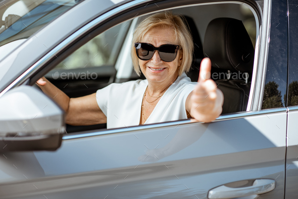 Senior woman driver in the car