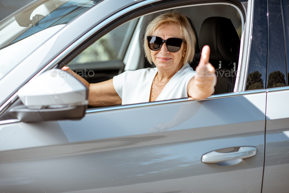 Senior woman driver in the car