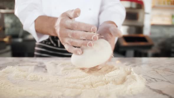 Italian Chef Making Dough for Pizza Traditional Food Man Working in Restaurant Kitchen High Cuisine alt