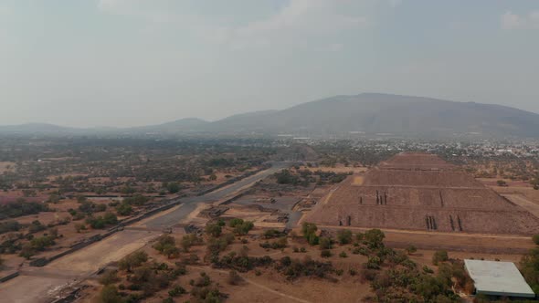 Slide and Pan Shot of Valuable Historical Archaeological Site with Pyramids and Other Ancient alt