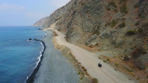 Motorbike Rider Happy Riding on Coastal Road, Hatay, Turkey