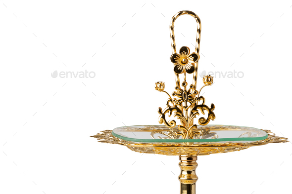 Oriental golden cake stand isolated on white background