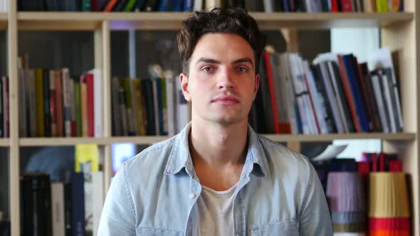 Portrait of Serious Young Man, Looking in Camera alt