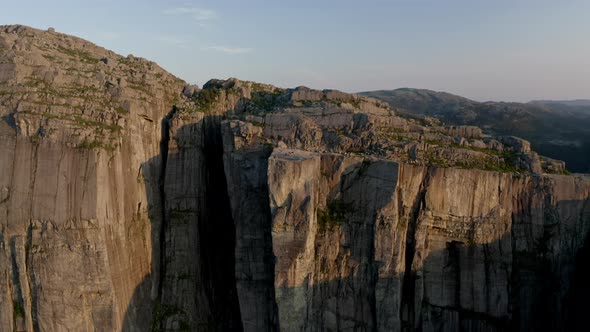 Drone Over Sunlit Rocky Mountain alt