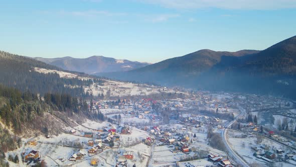 Aerial Drone View Beautiful Winter Mountains and a Valley in Which the Old Settlement Is Located alt