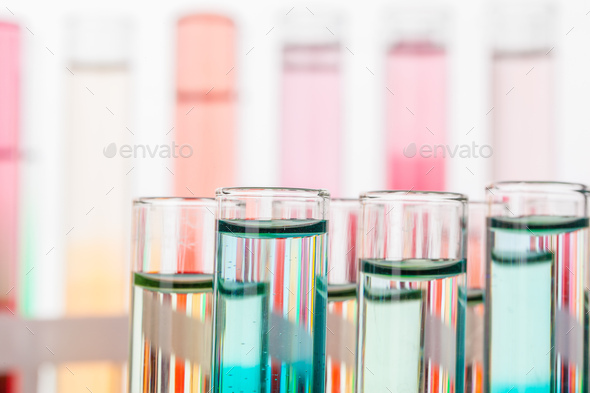 Glass laboratory chemical test tubes with liquid for analysis close up - Stock Photo - Images