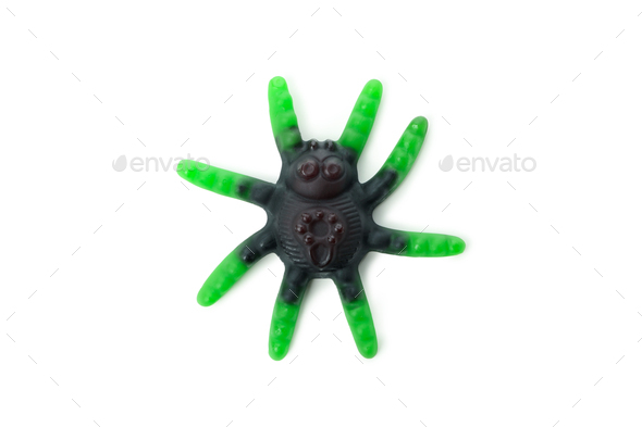 Gummy candy in the form of spider isolated on white background Stock