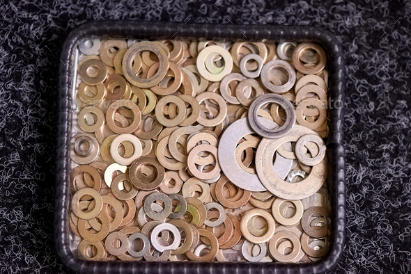 Steel washers on a plate. - Stock Photo - Images