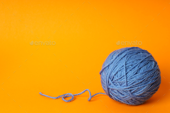 Balls of yarn with knitting needles on white background Stock Photo by  AtlasComposer