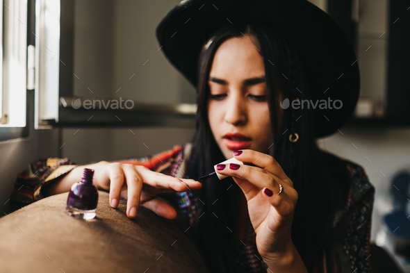 Young woman applying nail polish Stock Photo by ADDICTIVE_STOCK | PhotoDune