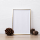 Composition of white card in frame with copy space and pine cones on white background - PhotoDune Item for Sale