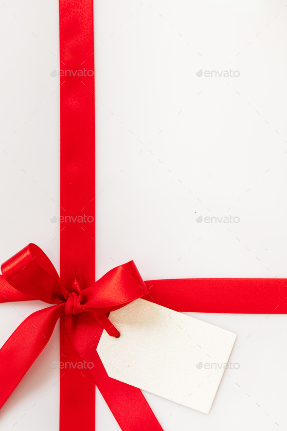 Christmas gift card blank and red ribbon bow on white background, New year  present concept Stock Photo by rawf8