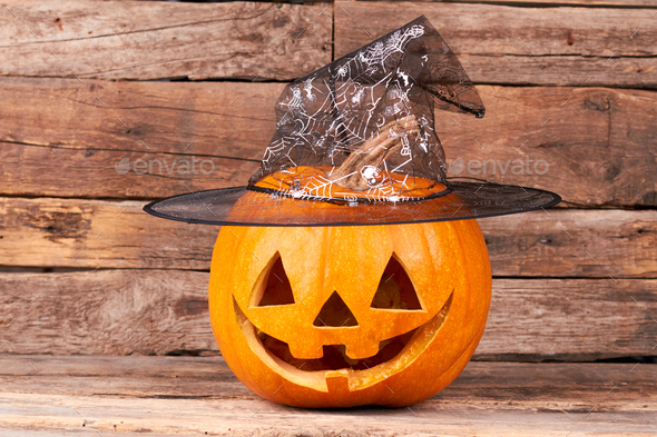 Halloween pumpkin with wizard hat.
