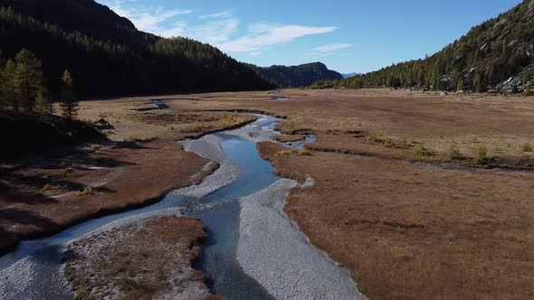 River on mountain plateau at Val Masino, Sondrio, Italy alt