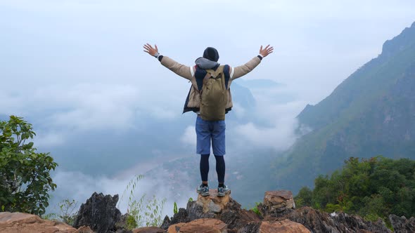 Hiker Cheer On The Top Of Mountain alt