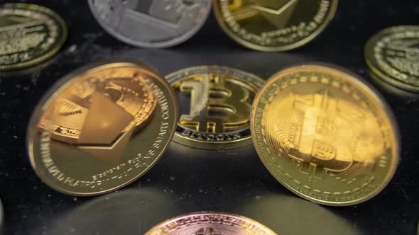 Crypto Coins On Black Table Gold Silver Bronze Bitcoin Ethereum Zcash Litecoin