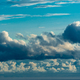 Panoramic view of bright blue sea, blue sky with fluffy white clouds - PhotoDune Item for Sale