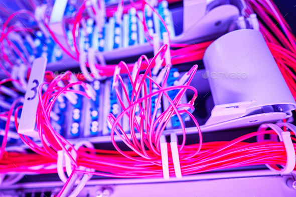 Bunch of cables in server rack with illumination