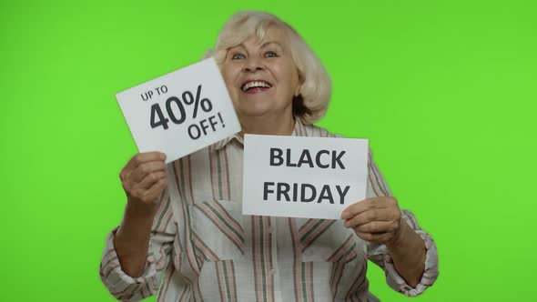 Senior Grandmother Showing Black Friday, 40 Percent Off Discount Advertisement Inscriptions alt