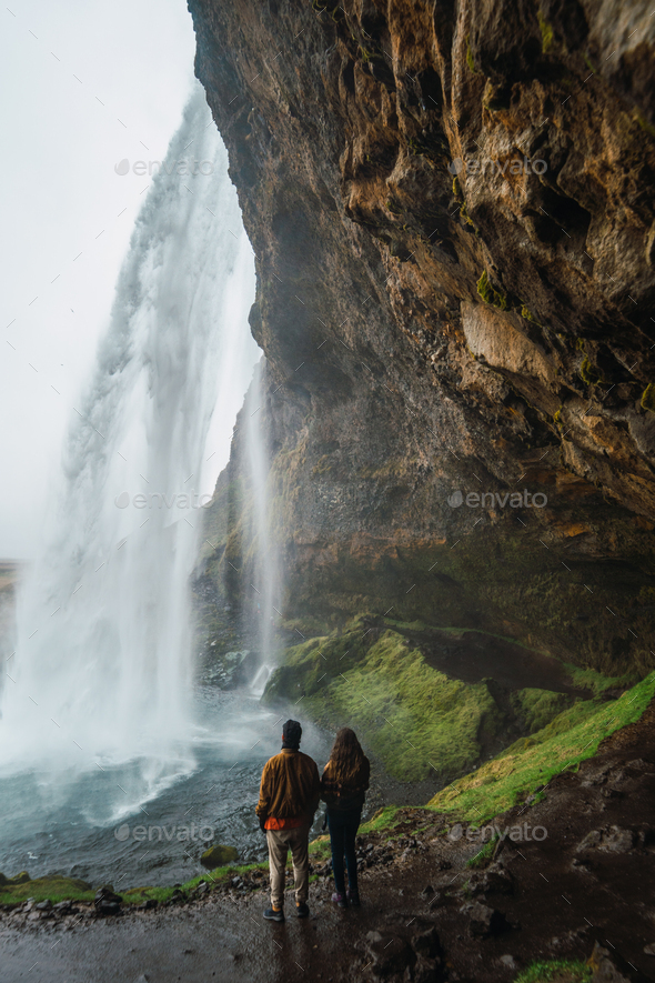 Male Hiker Near Waterfall During Rain Stock Photo - Download Image Now -  Men, Adventure, Waterfall - iStock
