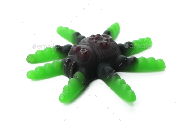 Gummy candy in the form of spider isolated on white background Stock