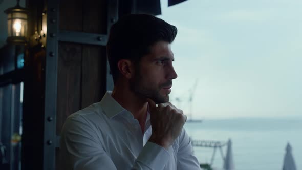 Serious Businessman Looking Seascape Resting Luxury Panoramic Cafe Alone Profile alt