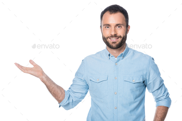 man presenting something isolated on white Stock Photo by LightFieldStudios