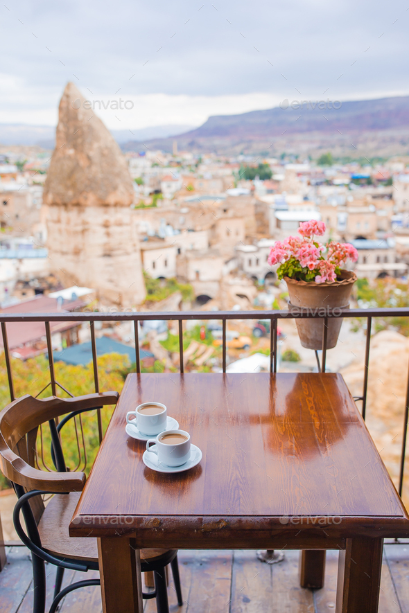 Cup with traditional Turkish coffee on a background of a valley in Cappadocia, Turkey