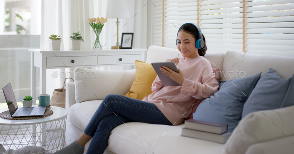Young teen asia happy people lady girl watch live event web video call - Stock Photo - Images