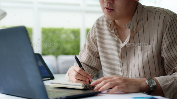 Asia people glasses chinese male busy talk discuss on desk at home - Stock Photo - Images