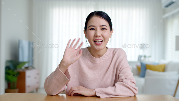 Portrait confident asia creative female vlogger make live talk video conference call