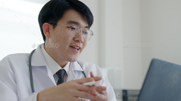Young asia people or male doctor live talk looking and speaking at laptop computer