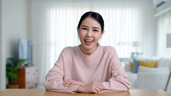 Portrait confident asia creative female vlogger make live talk video conference call