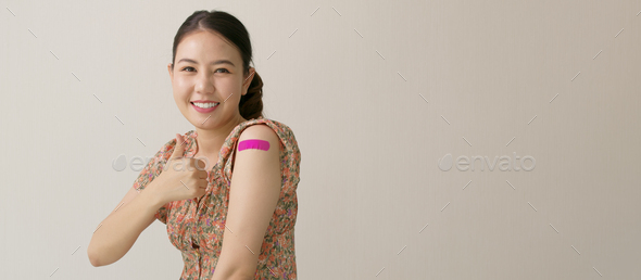 Banner attractive beautiful asia female or teenage receive covid-19 anti virus vaccine
