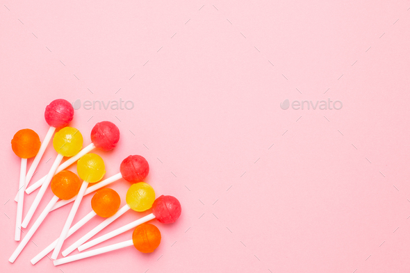 Pastel Pink Background With Sweet Pink Orange And Yellow Candies