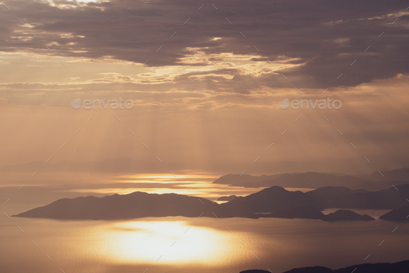 beautiful aerial panorama of mountains islands and sea at sunset - Stock Photo - Images