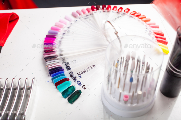 A palette of nail polishes, a circular sample of the color