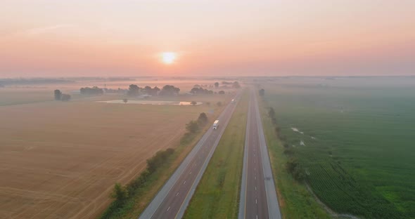 Magic Summer Morning Mist Over the Field on Countryside Across High Speed Highway alt