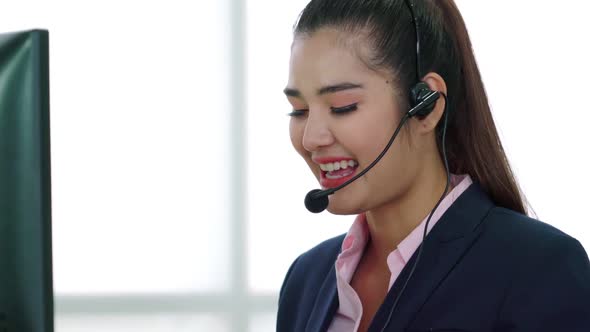 Business People Wearing Headset Working in Office alt