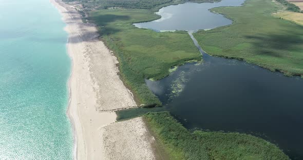 Beautiful landscape of lake, forest, beach and sea. Ezerets and Shabla lakes alt