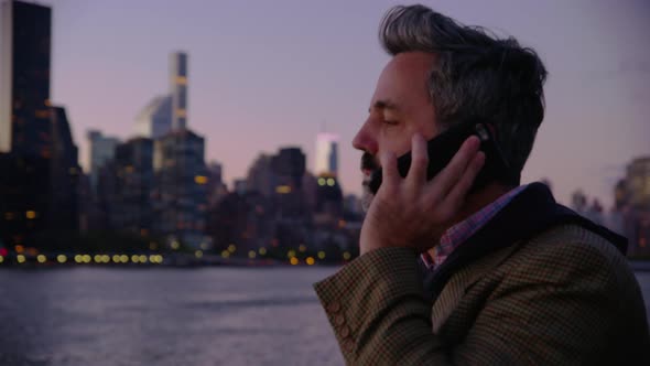 Man in New York City talking on cell phone