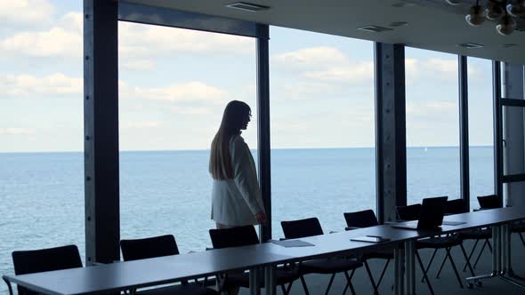 Corporate Manager Throwing Papers on Table in Conference Hall alt