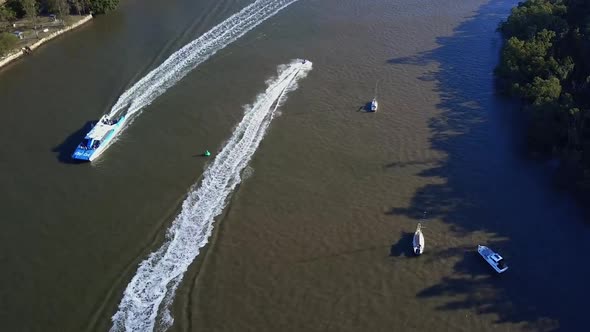 Aerial Shot of City Cat and jet ski on river, Brisbane Queensland alt