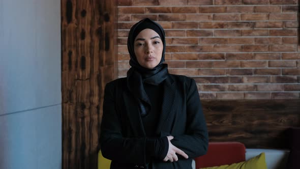 Muslim Independent Woman in Hijab Looking at Camera