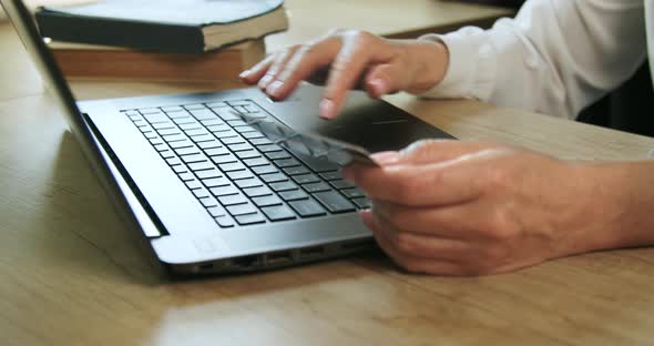 Woman Typing on Laptop Closeup