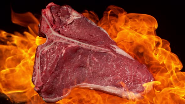 Super Slow Motion Footage of Premium Tbone Meat in Fire at 1000Fps alt