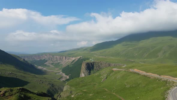 View of the Green Caucasus Mountains in Summer From the Sky alt