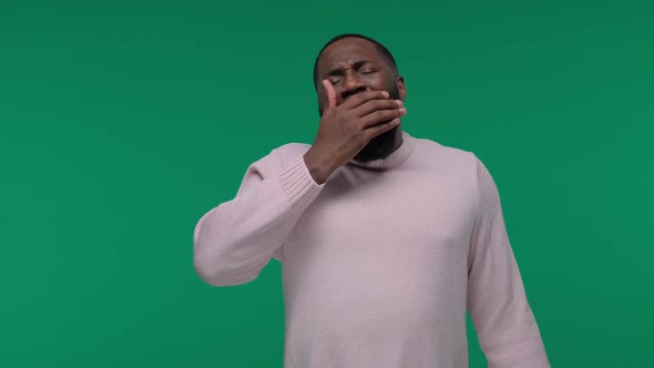 Sleepy Guy Bored Young Man Placing Hand on Mouth Yawning alt