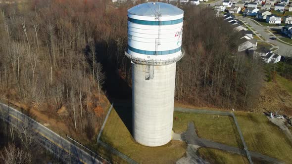 Drone shot of water tower on a spring day. alt